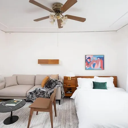 Sunny East Side Vintage Studio Apartment